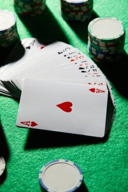 Live blackjack studio broadcast with dealer and card table visible